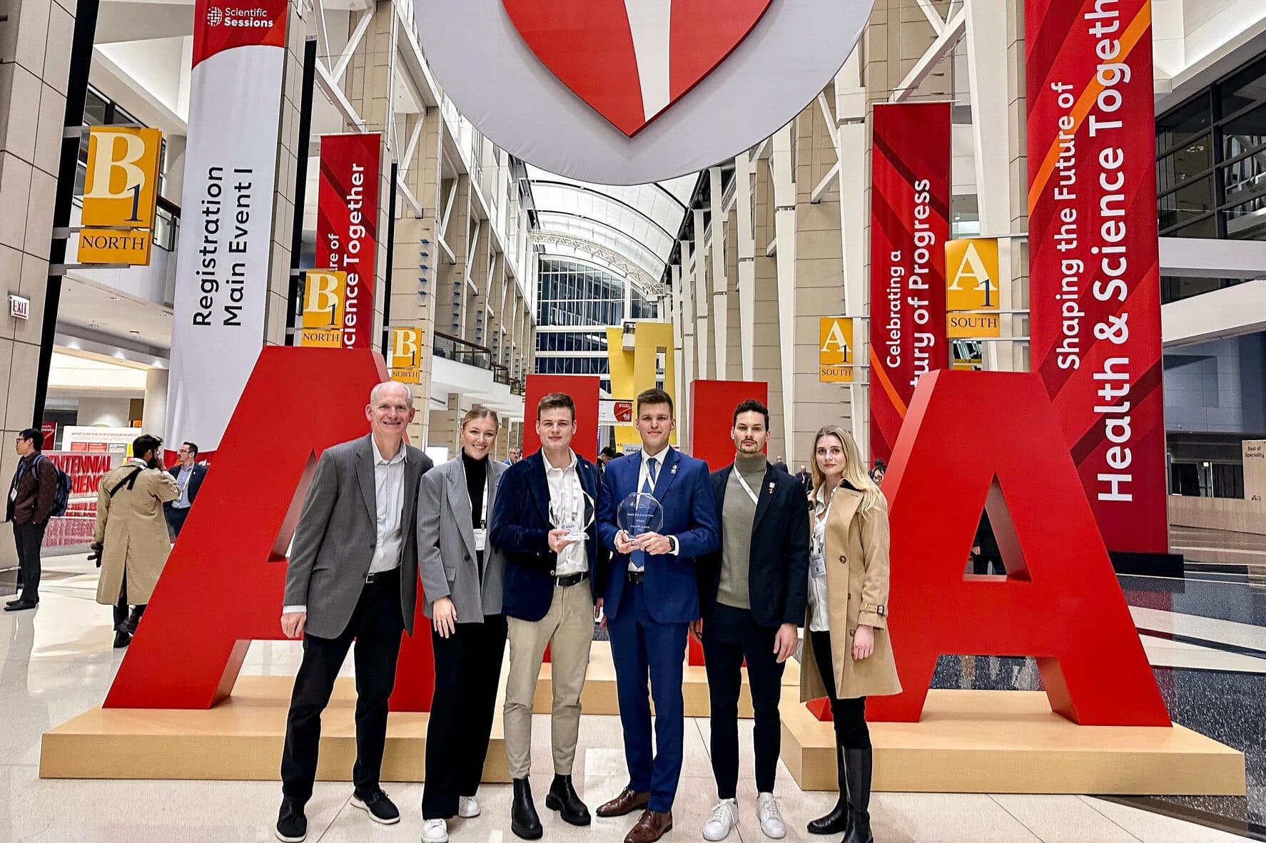 Powerful Medical team with two trophies under Scientific Sessions banners at AHA 2024