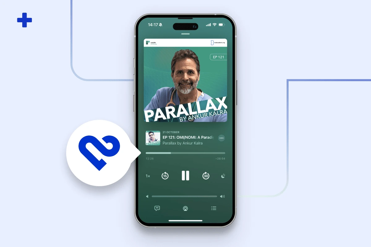 Smartphone playing Parallax podcast EP 121 on OMI NOMI with Dr Stephen Smith, beside the PMcardio logo