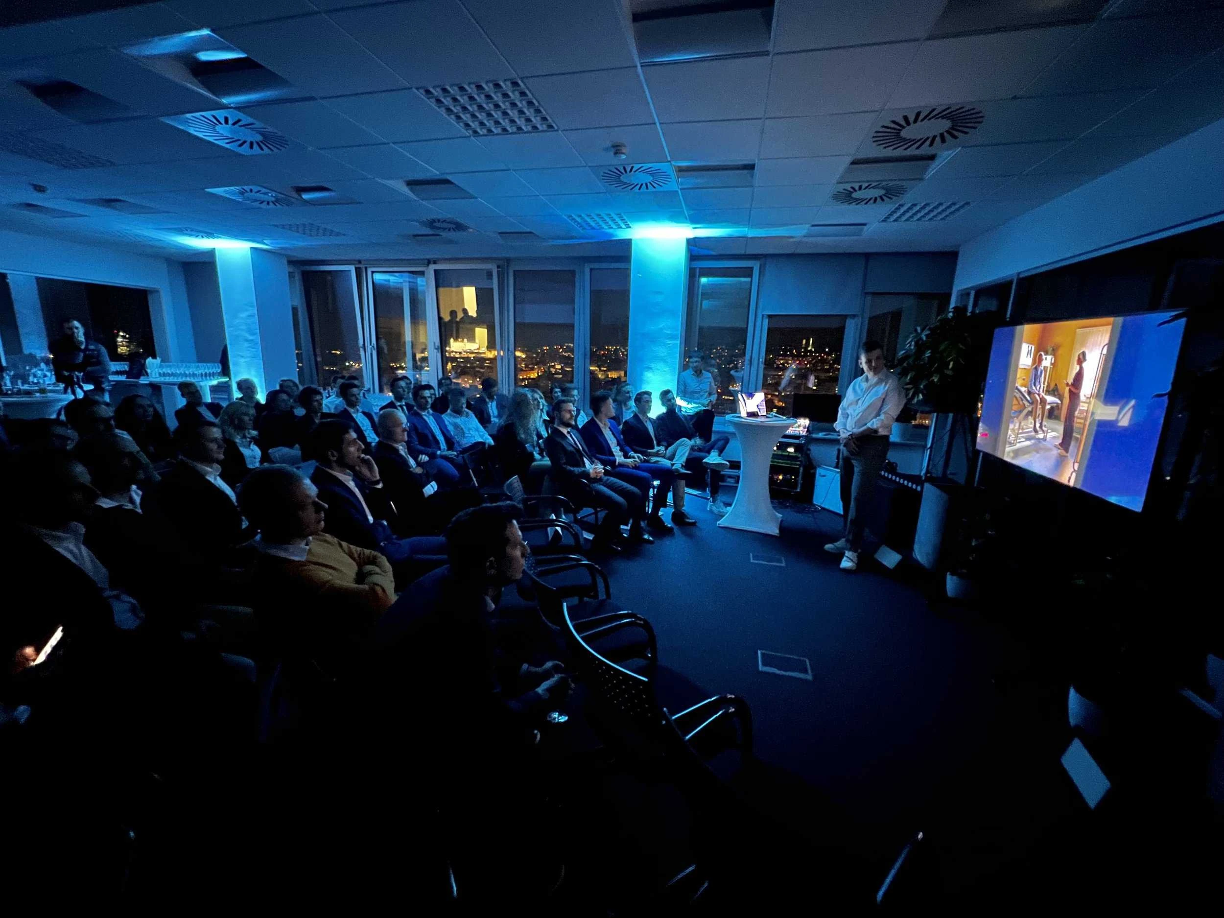 An image from Powerful Medical's investor event showing the CEO of Powerful Medical Martin Herman speaking to an audience