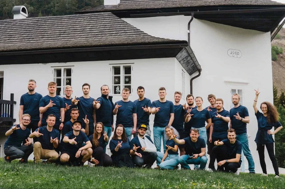 Powerful Medical team gathered outside a house at the 2022 company off-site