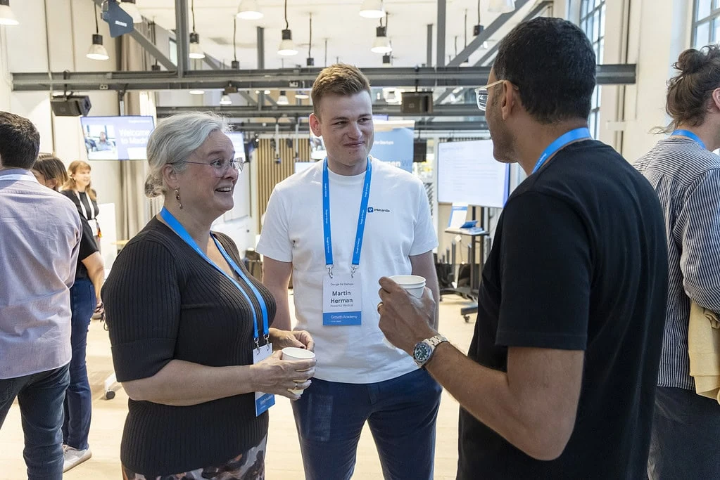 Powerful Medical CEO Martin Herman networking with attendees at Google Health in the AI Era in Madrid
