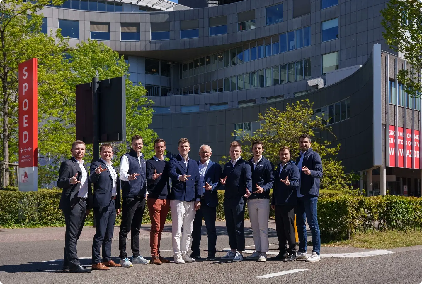 Powerful Medical team posing outside a hospital emergency department entrance