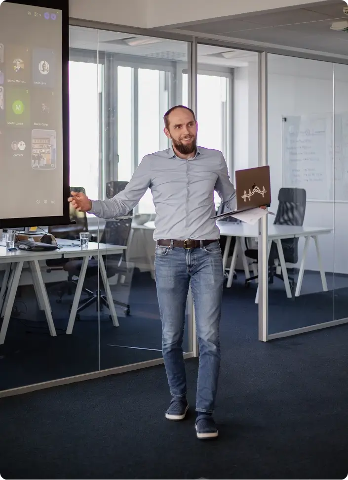 Powerful Medical team member presenting with a laptop during a video call in the office